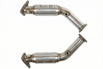 Pair of metallic exhaust pipes on a white background