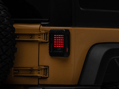Raxiom 07-18 Jeep Wrangler JK LED Tail Lights- Black Housing (Smoked Lens) J115435 J115435 Photo - Primary