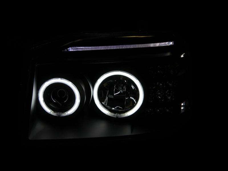 Anzo 2001-2004 Nissan Frontier Projector Headlights w/ Halo Black (CCFL) 111172 Photo - Mounted