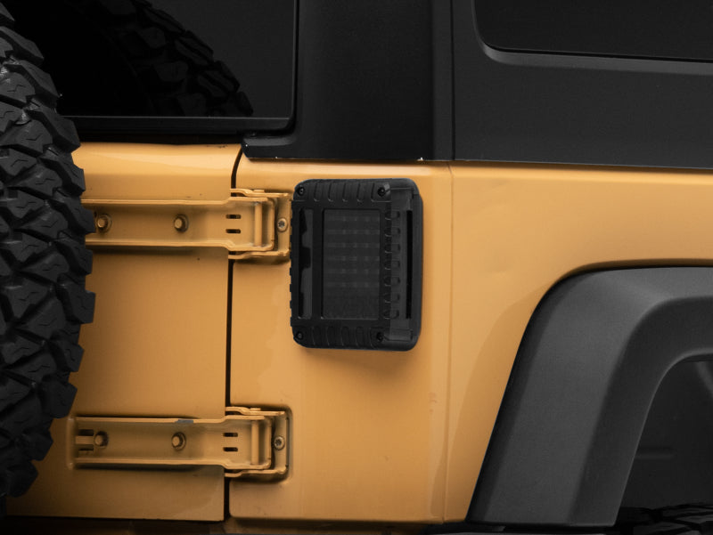 Raxiom 07-18 Jeep Wrangler JK LED Tail Lights- Black Housing (Smoked Lens) J115435 J115435 Photo - Close Up