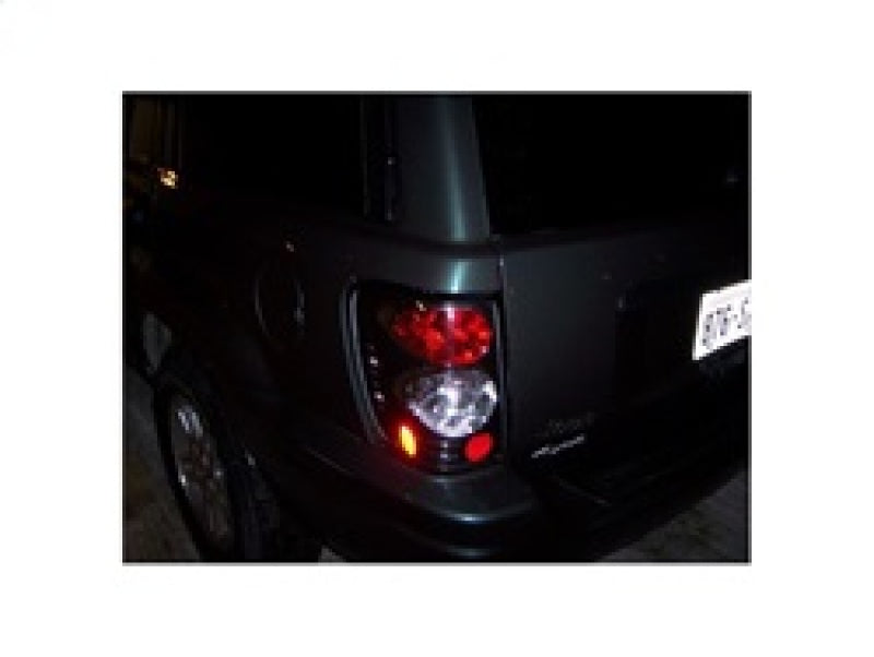 Spyder Jeep Grand Cherokee 99-04 Euro Style Tail Lights Black ALT-YD-JGC99-BK 5005625 5005625 Photo - Mounted