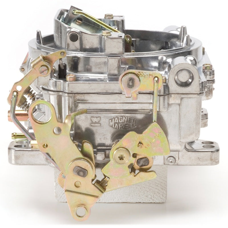 Edelbrock Reconditioned Carb #1406, 1 7/8" x 3 1/2"  Steel Collector w/ 7-8" 9906 Photo - Unmounted