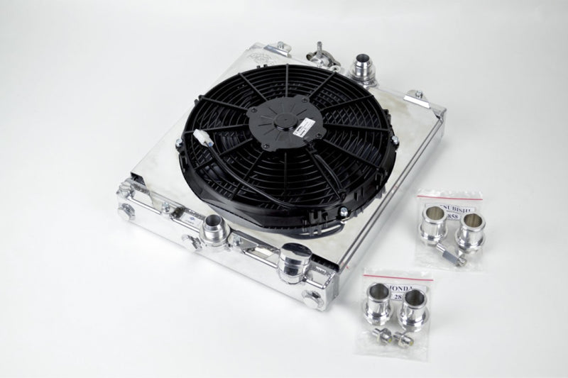 CSF Universal Half Radiator w/ direct fitment for Evo 7/8/9 and 92-00 2858X Photo - out of package