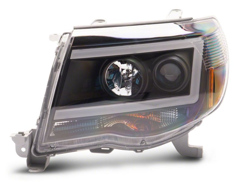 Raxiom 05-11 Toyota Tacoma Axial Series LED DRL Projector Headlights- Blk Housing (Clear Lens) TT11236 TT11236 Photo - Close Up