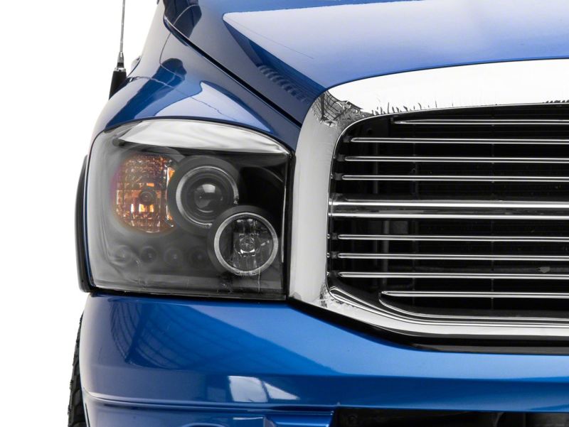 Raxiom 06-08 Dodge RAM 1500 LED Halo Projector Headlights- Blk Housing (Clear Lens) R110149 R110149 Photo - Close Up