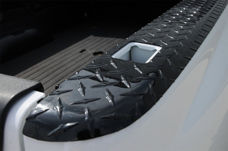 Dee Zee Deezee 99-07 Chevrolet Silverado/Sierra Bed Cap Wrap W/Stake Pockets Black-Tread Aluminum 8Ft Bed DZ11993B DZ11993B Photo - Mounted