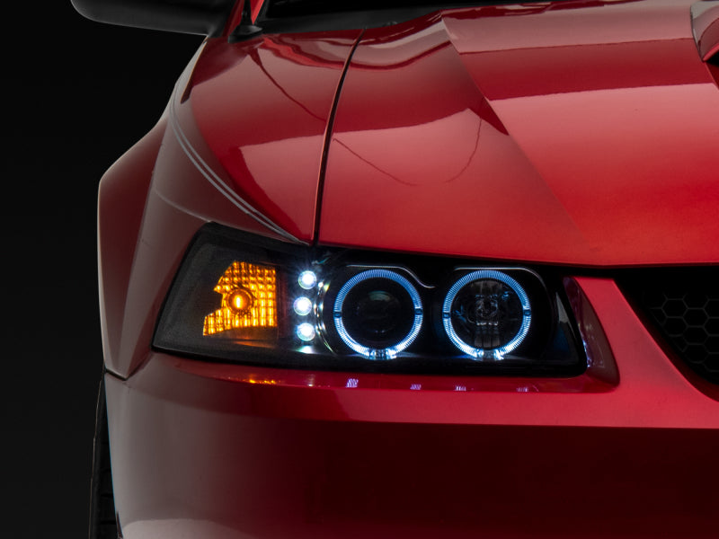 Raxiom 99-04 Ford Mustang Dual LED Halo Projector Headlights- Black Housing (Clear Lens) 101684 101684 Photo - Close Up