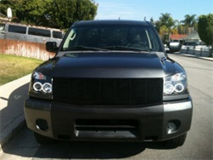 Spyder Nissan Titan 04-14/Armada 04-07 Projector Headlights CCFL Halo LED Blk PRO-YD-NTI04-CCFL-BK 5030207 5030207 Photo - Mounted