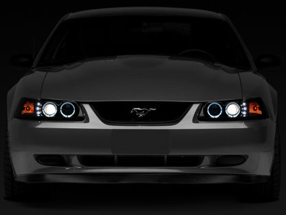Raxiom 99-04 Ford Mustang Dual LED Halo Projector Headlights- Black Housing (Smoked Lens) 49113 49113 Photo - Close Up