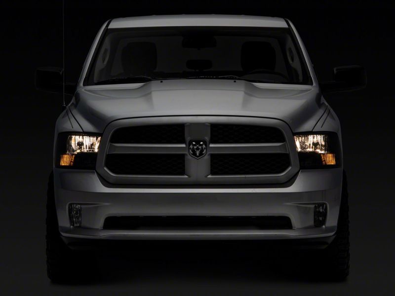 Raxiom 09-18 Dodge RAM 1500 Axial OEM Rep Headlights w/ Dual Bulb- Chrome Housing (Smoked Lens ) R118021 R118021 Photo - Close Up