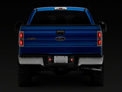 Raxiom 10-14 Ford F-150 Axial Series LED License Plate Lamps- Red and White T557361 T557361 Photo - Close Up