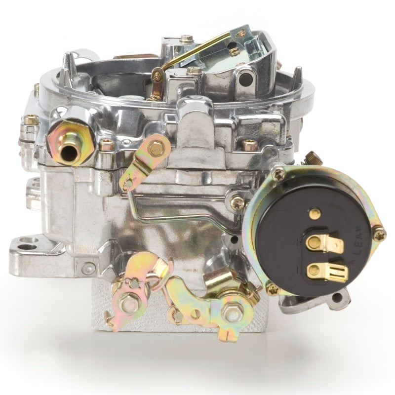Edelbrock Reconditioned Carb #1406, 1 7/8" x 3 1/2"  Steel Collector w/ 7-8" 9906 Photo - Unmounted