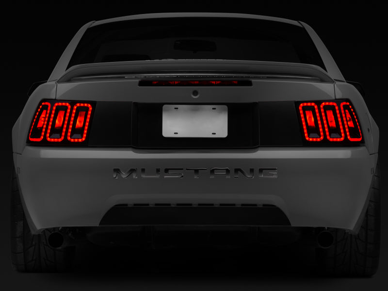 Raxiom 99-04 Ford Mustang Excluding 99-01 Cobra Icon LED Tail Lights- Black Housing (Smoked Lens) 100807 100807 Photo - Close Up