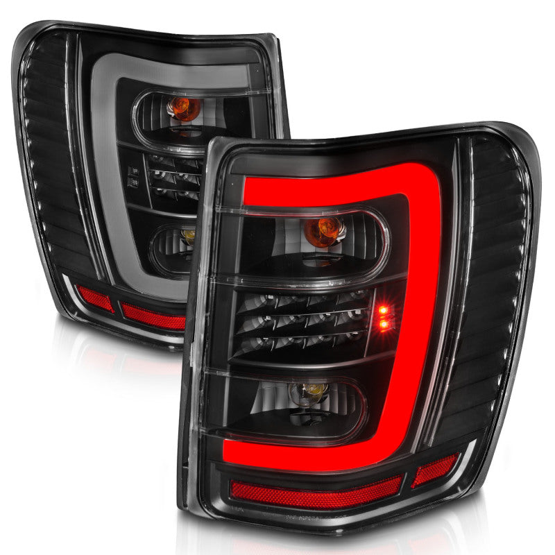 ANZO 1999-2004 Jeep Grand Cherokee LED Tail Lights w/ Light Bar Black Housing Clear Lens 311394 311394 Photo - Unmounted