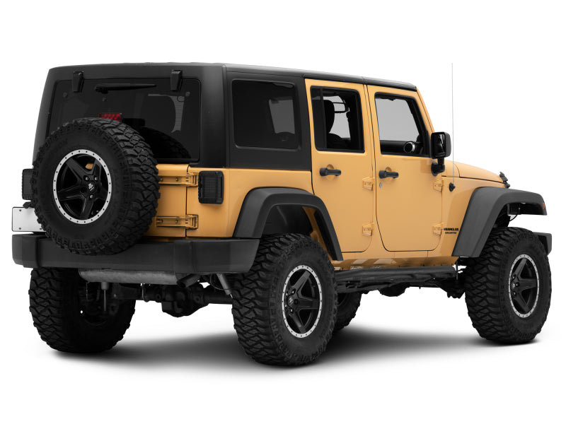 Raxiom 07-18 Jeep Wrangler JK LED Tail Lights- Black Housing (Smoked Lens) J115435 J115435 Photo - Close Up