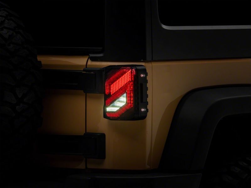 Raxiom 07-18 Jeep Wrangler JK Axial Series Trident LED Tail Lights- Blk Housing (Smoked Lens) J173718 J173718 Photo - Close Up
