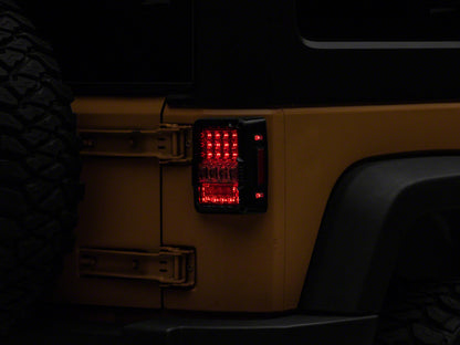 Raxiom 07-18 Jeep Wrangler JK Axial Series Lux LED Tail Lights- Blk Housing (Clear Lens) J141596 J141596 Photo - Primary