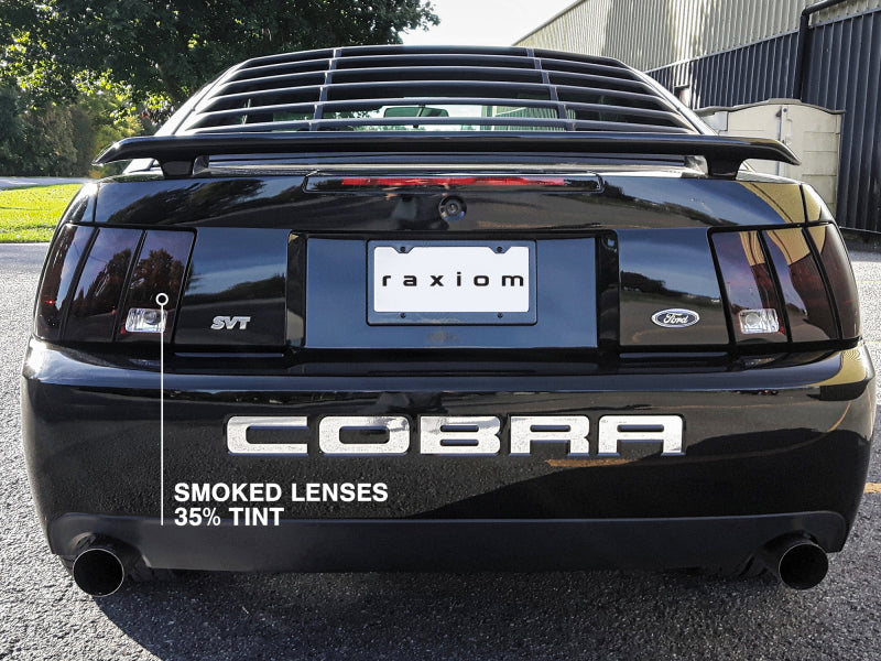 Raxiom 99-04 Ford Mustang Excluding 99-01 Cobra Tail Lights- Black Housing (Smoked Lens) 49080 49080 Photo - Close Up