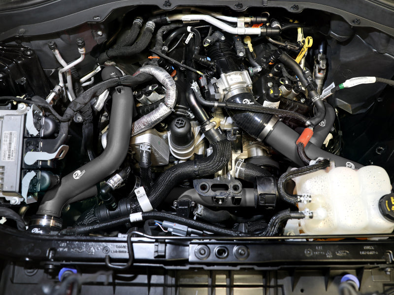 aFe Bladerunner 2-1/4 IN Aluminum Hot Charge Pipe Black 20-23 Ford Explorer/Explorer ST - Black 46-20658-B 46-20658-B Photo - Mounted