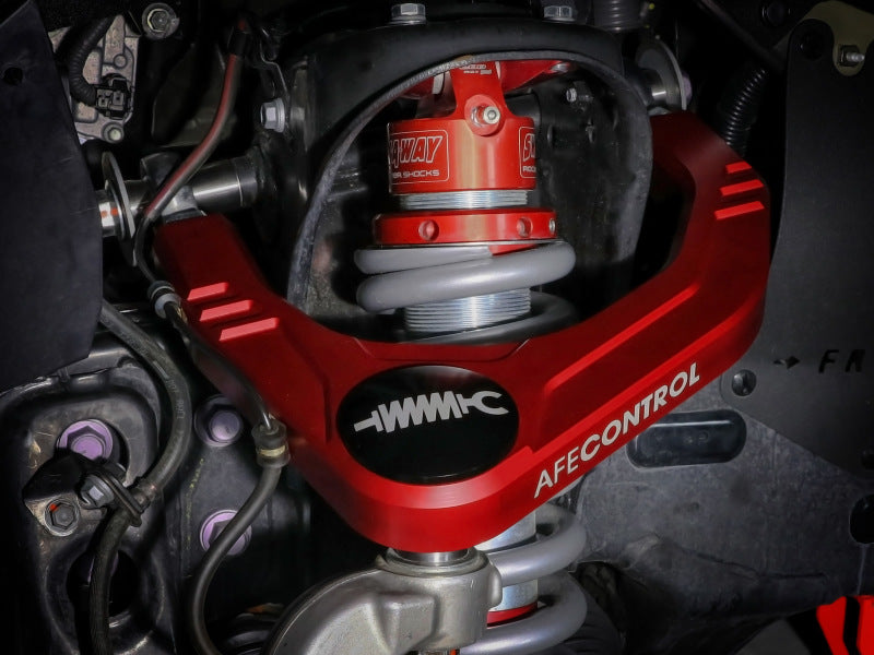 aFe Control 05-23 Toyota Tacoma Upper Control Arms - Red Anodized Billet Aluminum 460-72T005-R 460-72T005-R Photo - Mounted