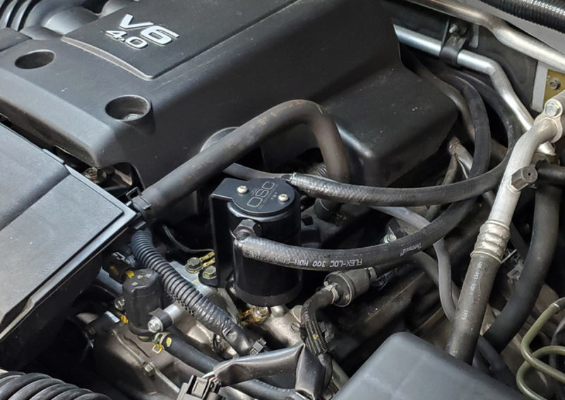 J&L 2005-2019 Nissan Frontier 4L Oil Separator 3.0 - Black Anodized 3109P-B 3109P-B Photo - Mounted