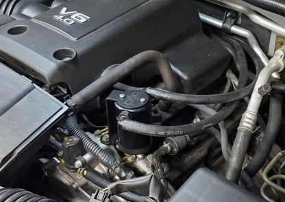 J&L 2005-2019 Nissan Frontier 4L Oil Separator 3.0 - Black Anodized 3109P-B 3109P-B Photo - Mounted