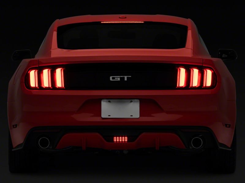 Raxiom 15-17 Ford Mustang Axial LED Reverse Light w/ Running Light Triple Flash Brake Light- Smoked 407864 407864 Photo - Close Up