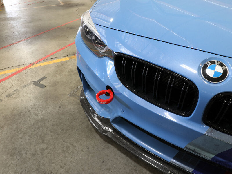 aFe Control Front Tow Hook Red BMW F-Chassis 2/3/4/M 450-502001-R 450-502001-R Photo - Mounted