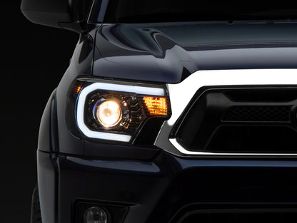 Raxiom 12-15 Toyota Tacoma Axial Series Projector Headlights w/ LED Bar- Blk Housing (Clear Lens) TT21849 TT21849 Photo - Primary