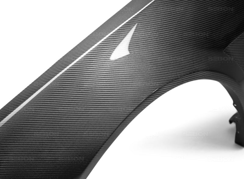 Seibon 99-01 Nissan Skyline R34 NSW-Style Carbon Fiber (Gloss Finish) Fenders (Pair) FF9901NSR34-NSW FF9901NSR34-NSW Photo - Primary