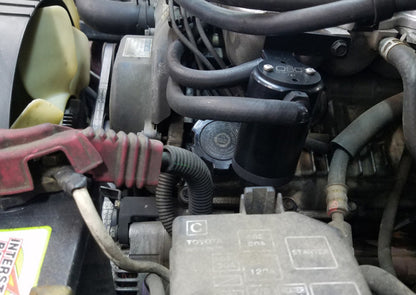 J&L 95-04 Toyota Tacoma/4Runner 3.4L Driver Side Oil Separator 3.0 - Black Anodized 3101D-B 3101D-B Photo - Mounted