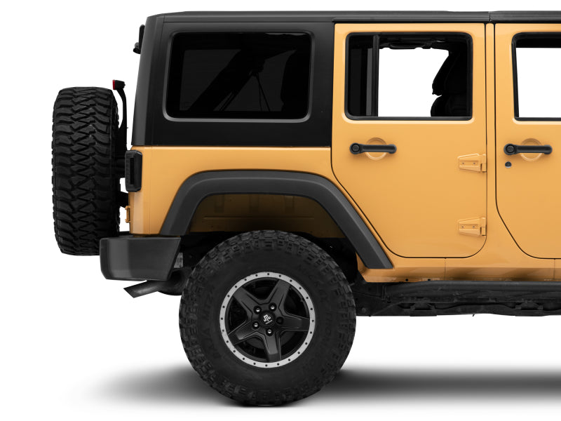 Raxiom 07-18 Jeep Wrangler JK LED Tail Lights- Black Housing (Smoked Lens) J115435 J115435 Photo - Close Up