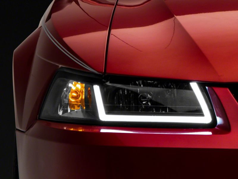 Raxiom 99-04 Ford Mustang Axial Series Headlights w/ LED Bar- Blk Housing (Clear Lens) 422712 422712 Photo - Close Up