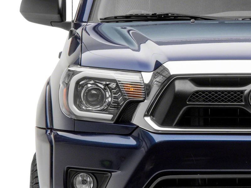 Raxiom 12-15 Toyota Tacoma Axial Projector Headlights w/ SEQL LED Bar- Blk Housing (Clear Lens) TT21850 TT21850 Photo - Close Up