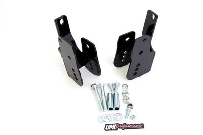 UMI Performance 05-14 Ford Mustang Rear Control Arm Relocation Brackets- Bolt In 1060-B 1060-B Photo - Primary