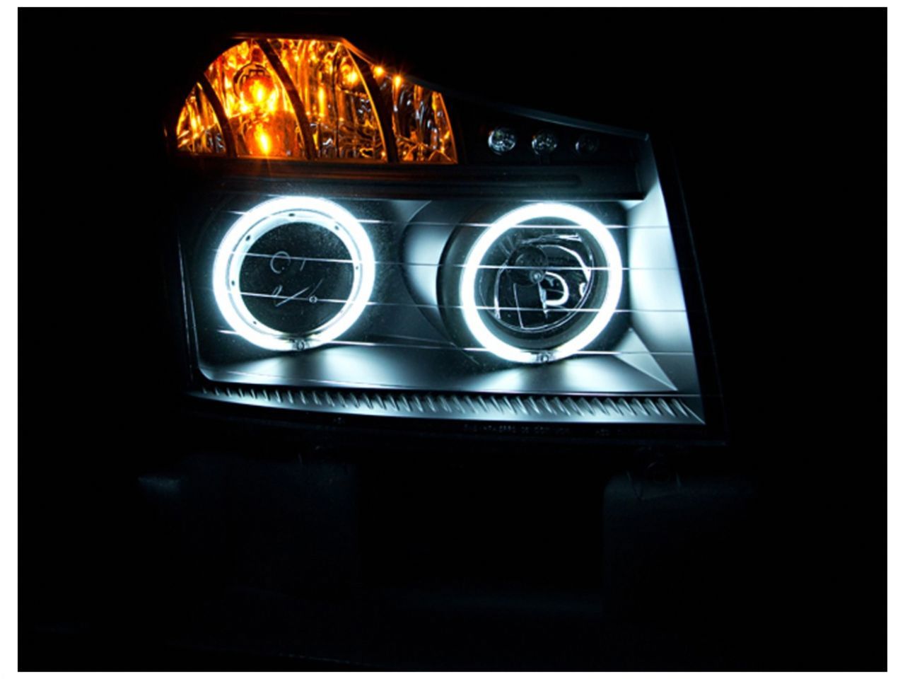 Anzo 2008-2015 Nissan Titan Projector Headlights w/ Halo Black (CCFL)