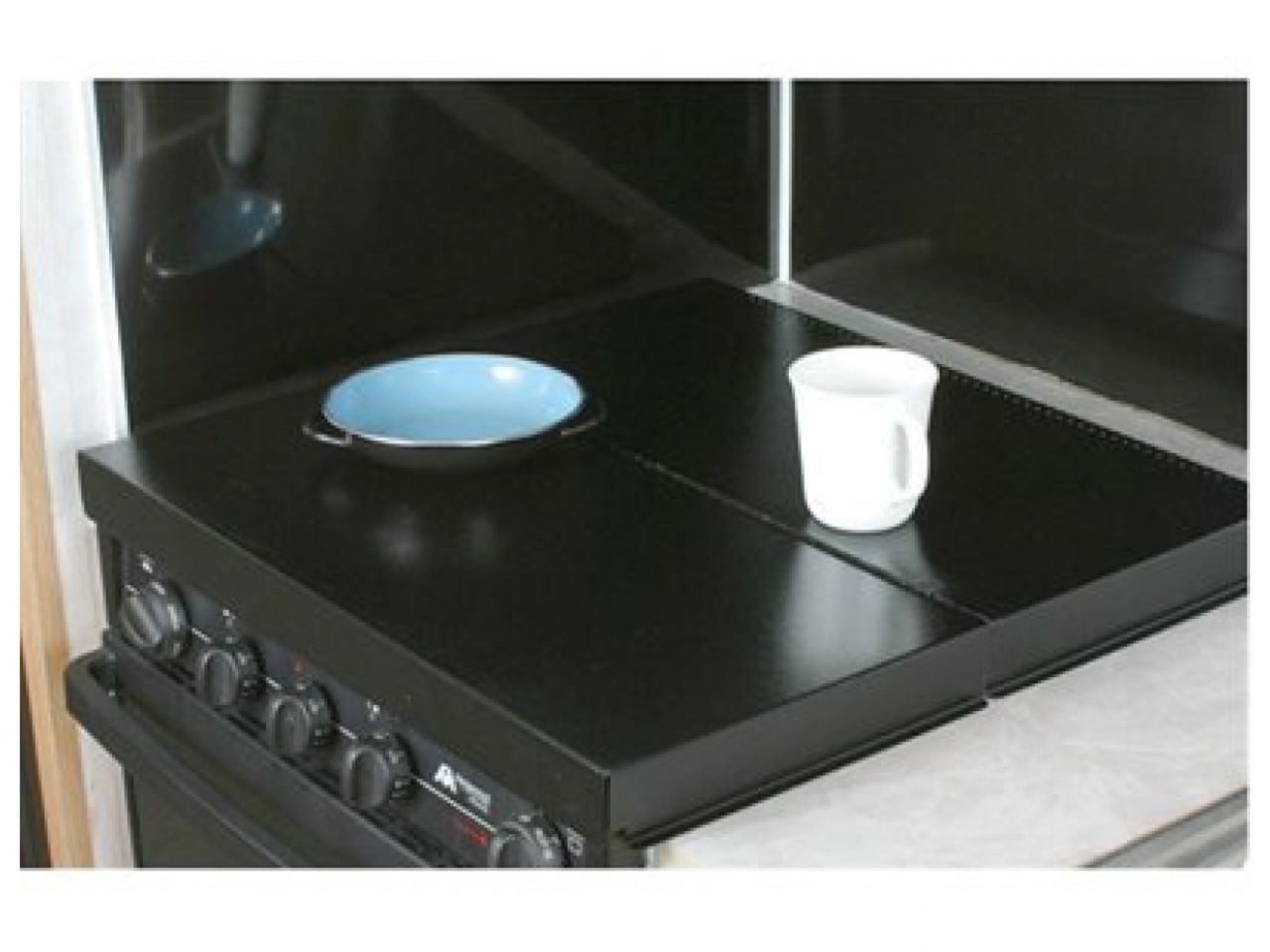 Camco Stove Top Cover - Black Universal Fit Bilingual