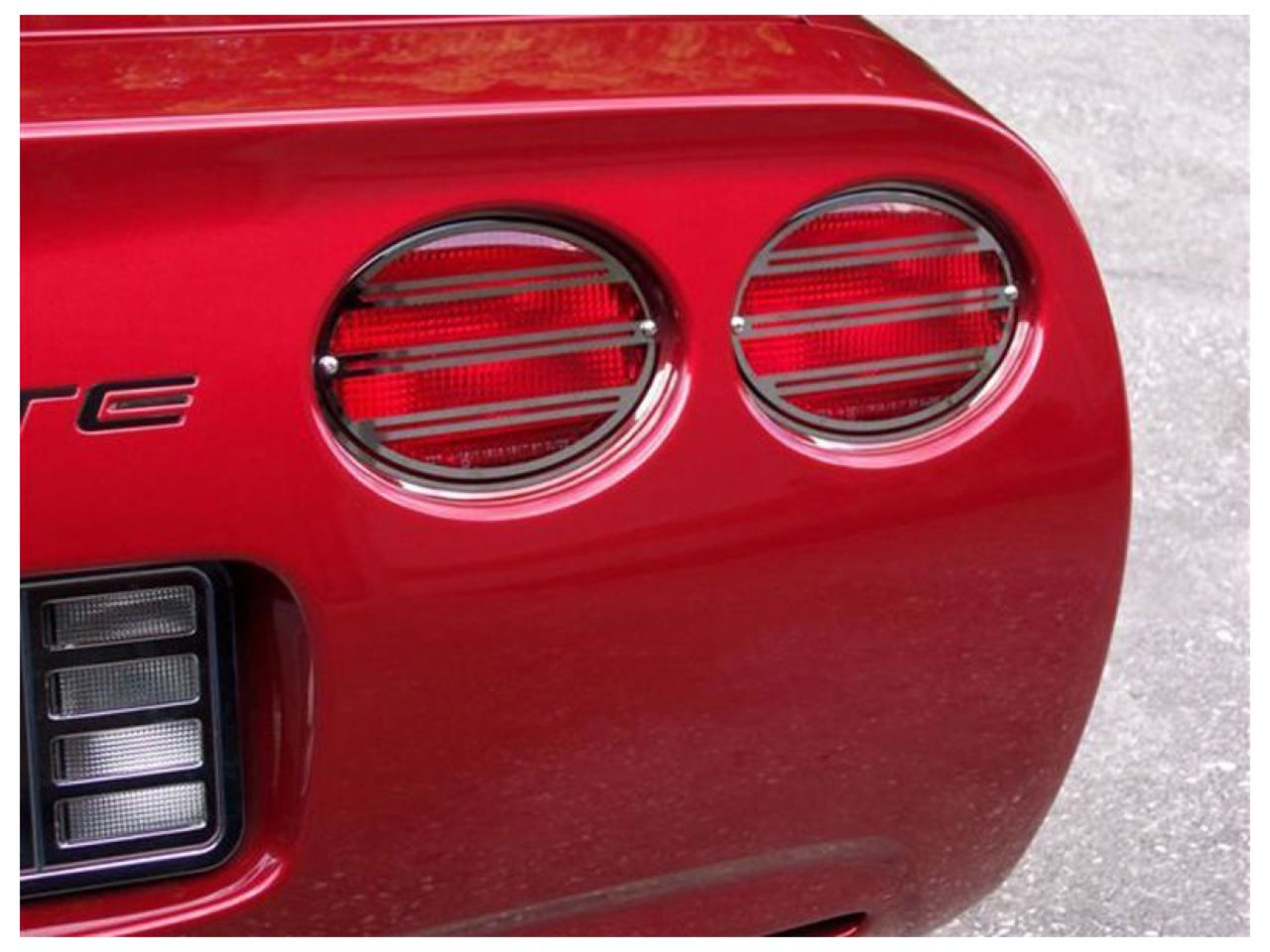 American Car Craft (ACC) Tailgate Light;Corvette Taillight Grilles 4Pc Slotted Polished 97-04