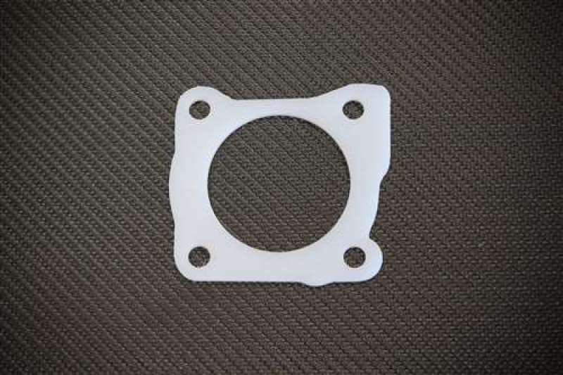 Torque Solution Thermal Throttle Body Gasket: DSM Eclipse / Talon / Laser 1st Gen 4G63 Turbo Only TS-TBG-016 Main Image