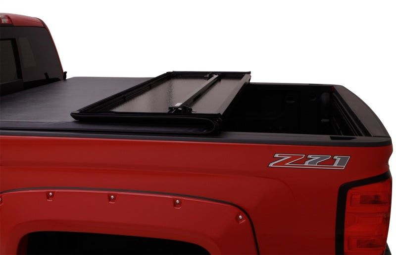 Lund 05-15 Toyota Tacoma Fleetside (6ft. Bed) Hard Fold Tonneau Cover - Black 969550